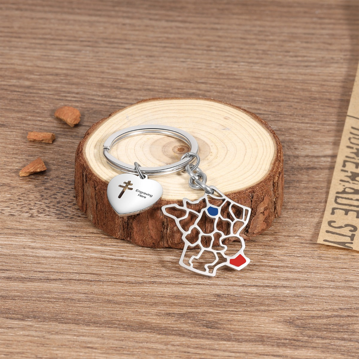 name necklace , Custom Map Keychain on wooden surface with name necklace.