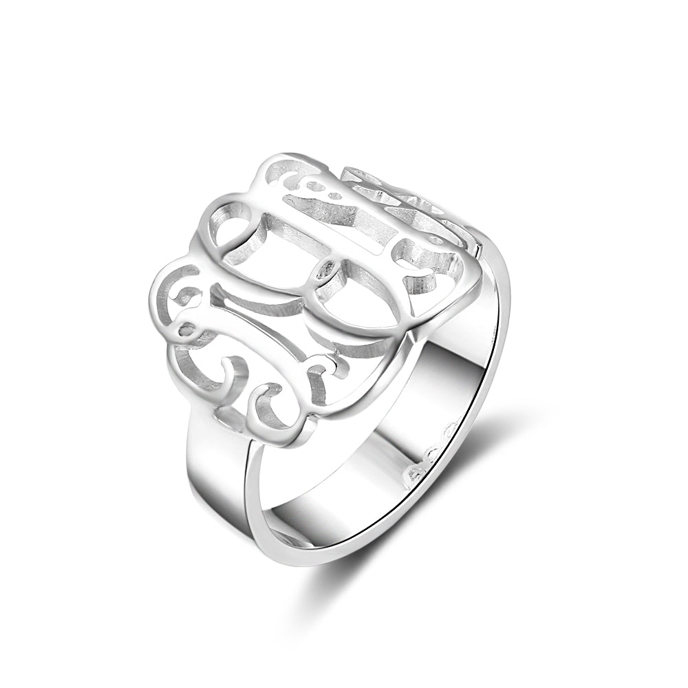 name earrings, Silver ring with intricate loops and curves, showcasing personalized jewelry design