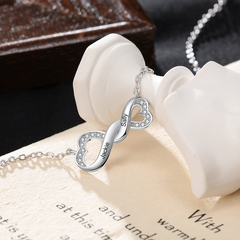 bracelet, Silver personalized heart necklace with names Jackie and Sally on white paper
