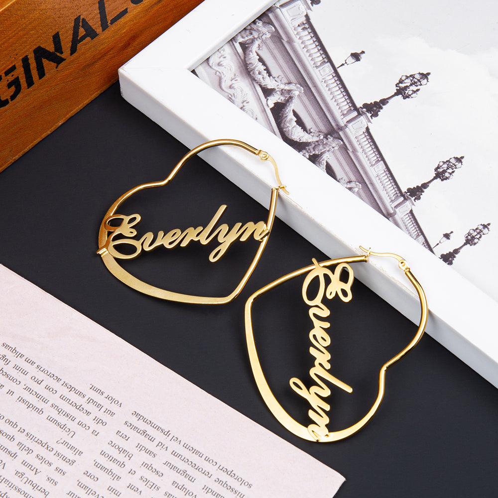 stone bead necklace, gold hoop earrings featuring the names Everlyn and Beverly on black background