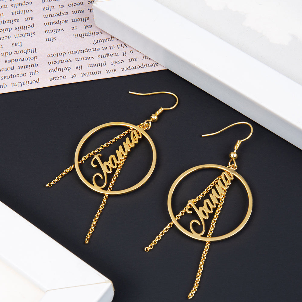 christmas keychain, Gold hoop earrings with Joanna pendant, personalized jewelry on black and white backdrop.