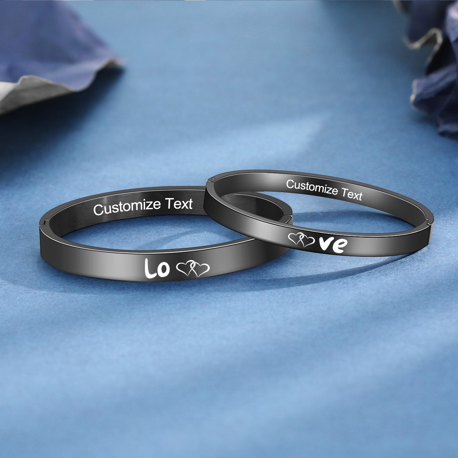 name keychain, Black couple bracelet pair inscribed with "love" heart on blue background