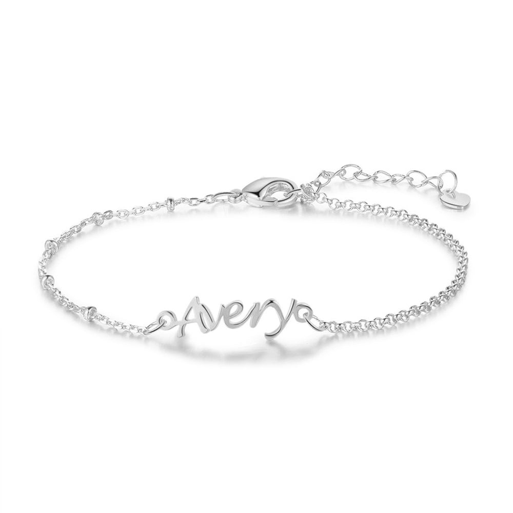 heart photo necklace, Delicate silver personalized bracelet with 'Avery' charm on white background