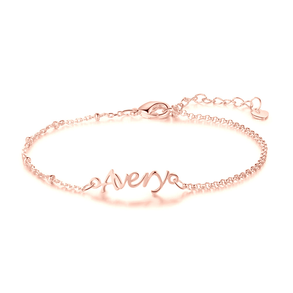 birth stone bracelet, Rose gold personalized bracelet with "Avery" charm on elegant adjustable chain.