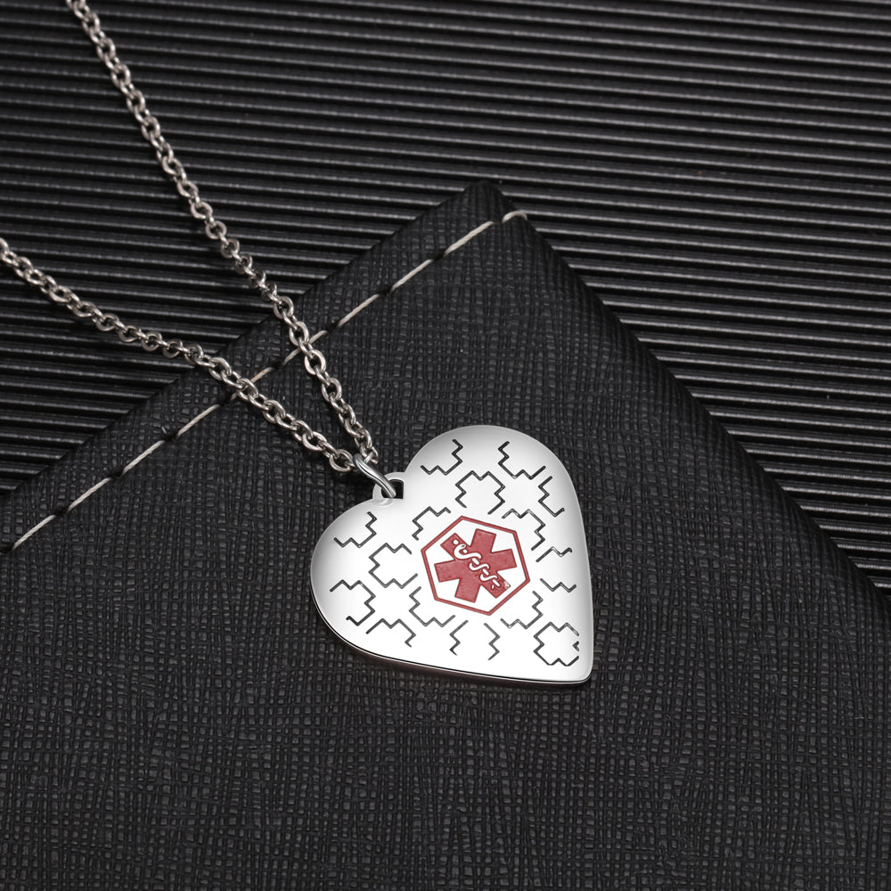 btithsday stone , Silver heart Medical ID Necklace with red cross on black background