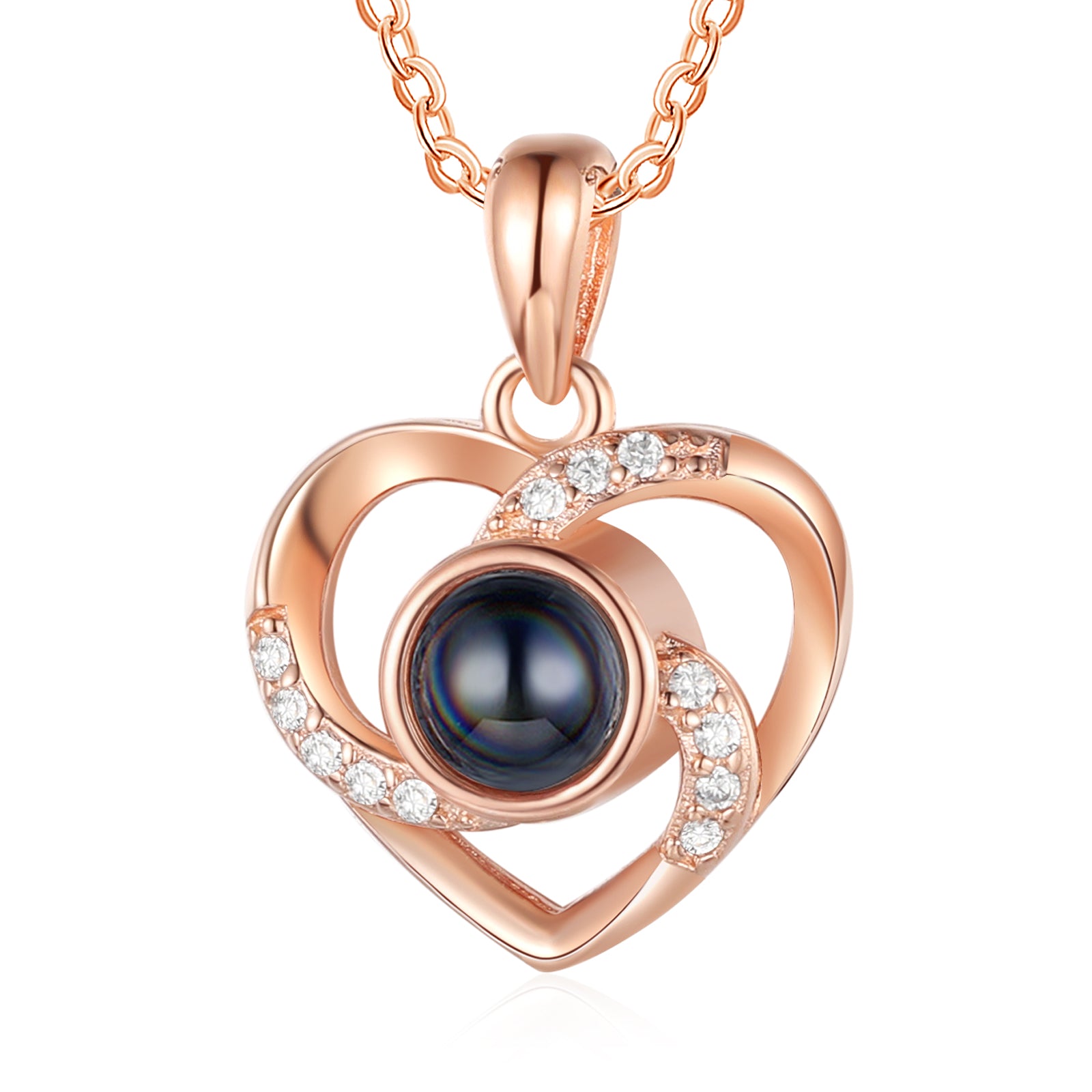 Rose gold heart necklace with blue gemstone, halo details; no bead bracelet visible.