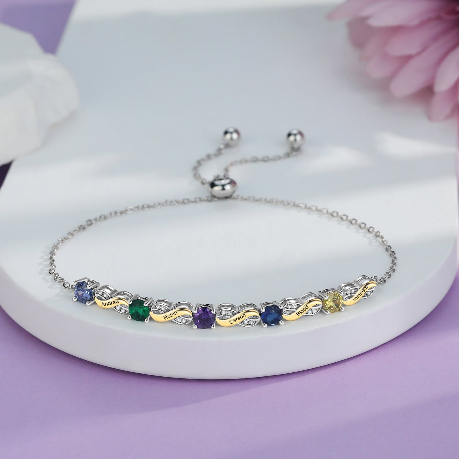 Custom Birthstone Bracelet with vibrant colored gemstones on a silver chain.