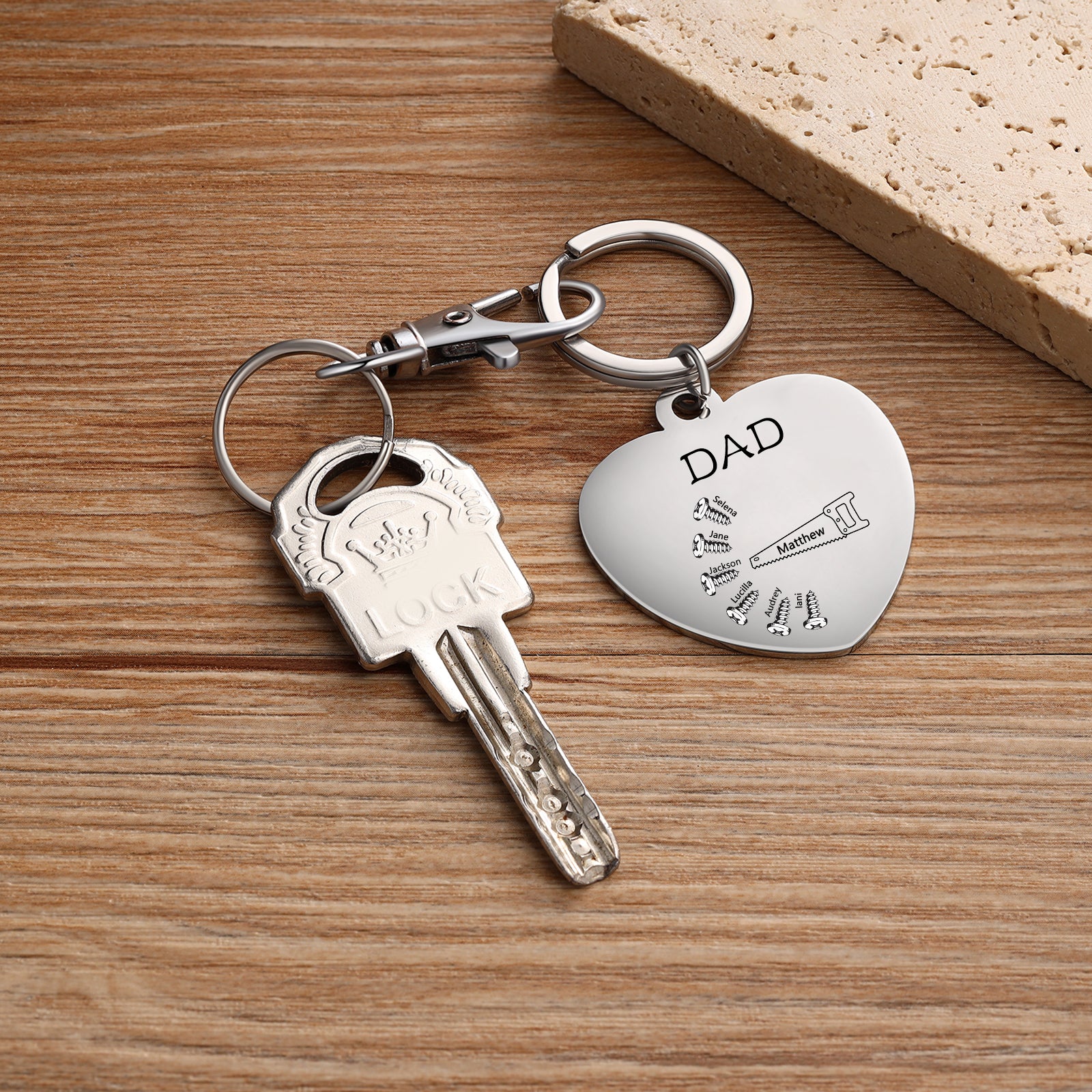 birthday bracelet, Custom Keychain with "DAD" on heart tag, silver on rustic wooden surface