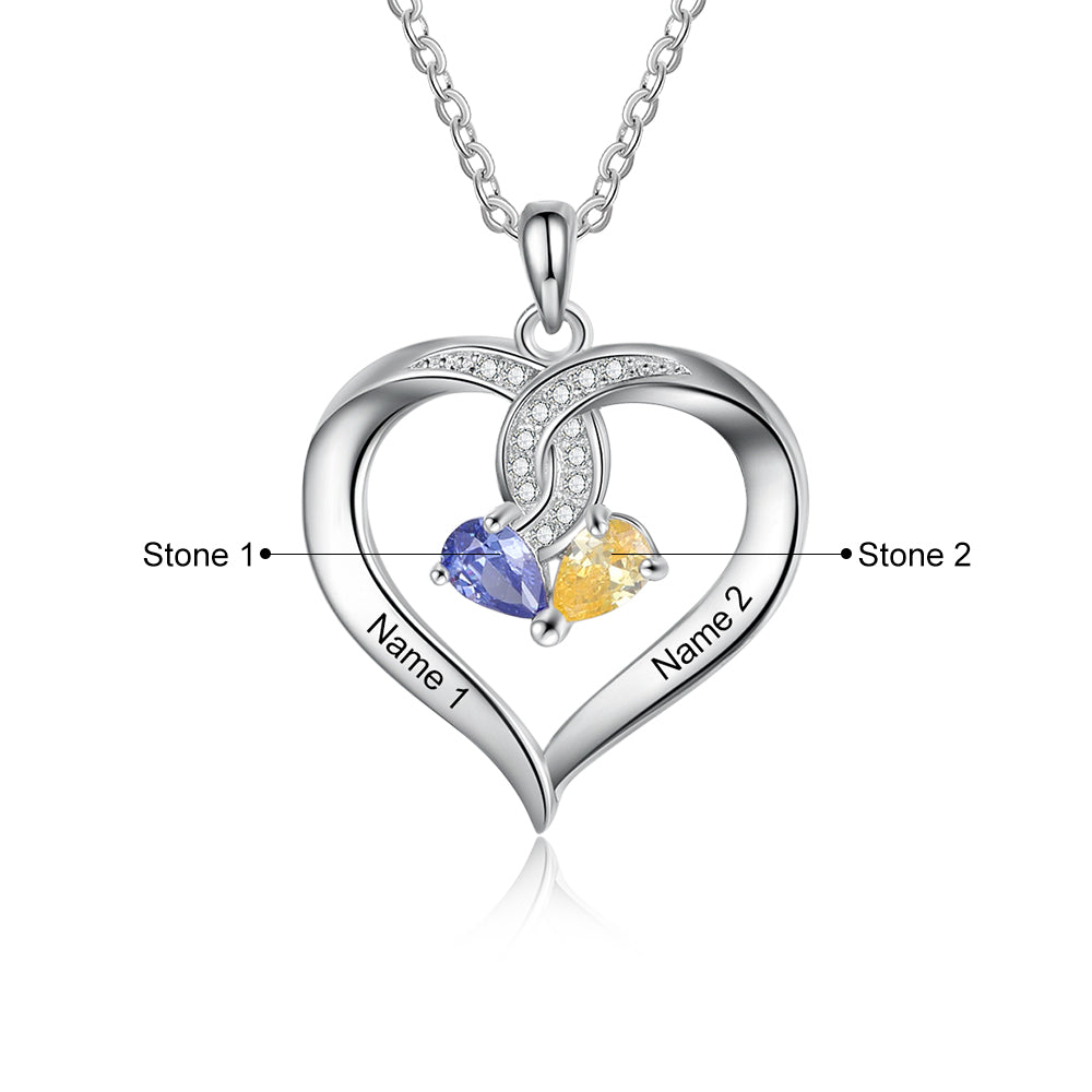 bracelet, Silver Heart Necklace with blue and yellow stones on a white background